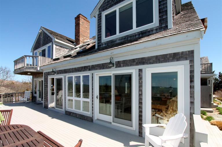 40 Bayshore Lane Eastham, MA 02642 - Photo 12 of 35 a view of a building with a porch