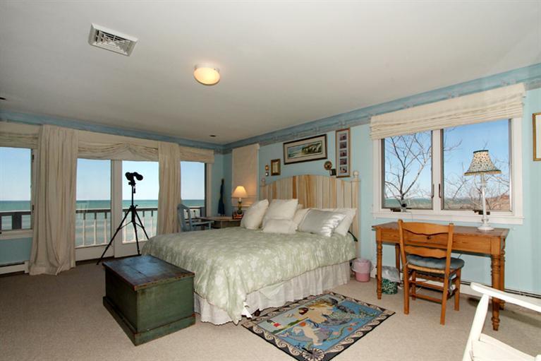 40 Bayshore Lane Eastham, MA 02642 - Photo 18 of 35 a living room with furniture and a window