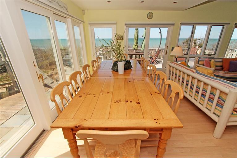 40 Bayshore Lane Eastham, MA 02642 - Photo 3 of 35 a living room with large windows