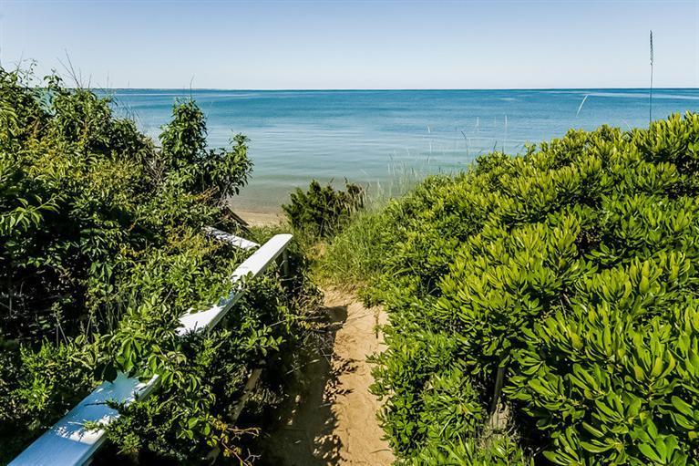 40 Bayshore Lane Eastham, MA 02642 - Photo 5 of 35 a view of a lake with a lake