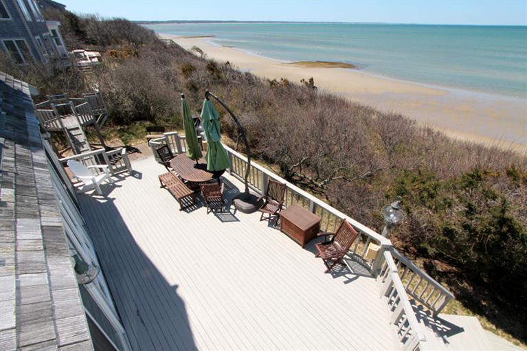 40 Bayshore Lane Eastham, MA 02642 - Photo 9 of 35 a view of a balcony with chairs