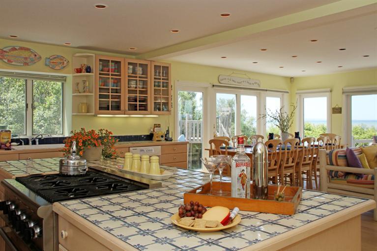 40 Bayshore Lane Eastham, MA 02642 - Photo 10 of 35 a kitchen with a stove and a large window