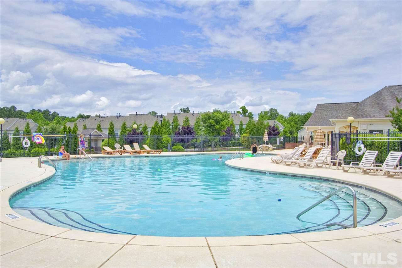 7725 Winners Edge Street Raleigh, NC 27617 - Photo 25 of 25 a view of a swimming pool with a patio