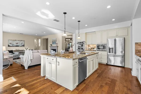 a kitchen with a cabinets and appliances