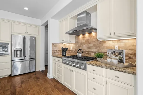 a bathroom with a sink toilet