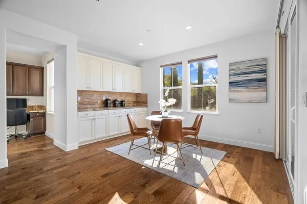 a bathroom with a tub a sink and a shower