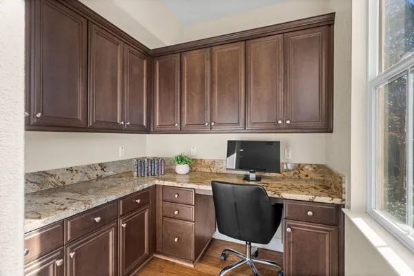 a kitchen with sink cabinets and appliances