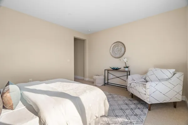 a bathroom with a sink toilet tub and shower