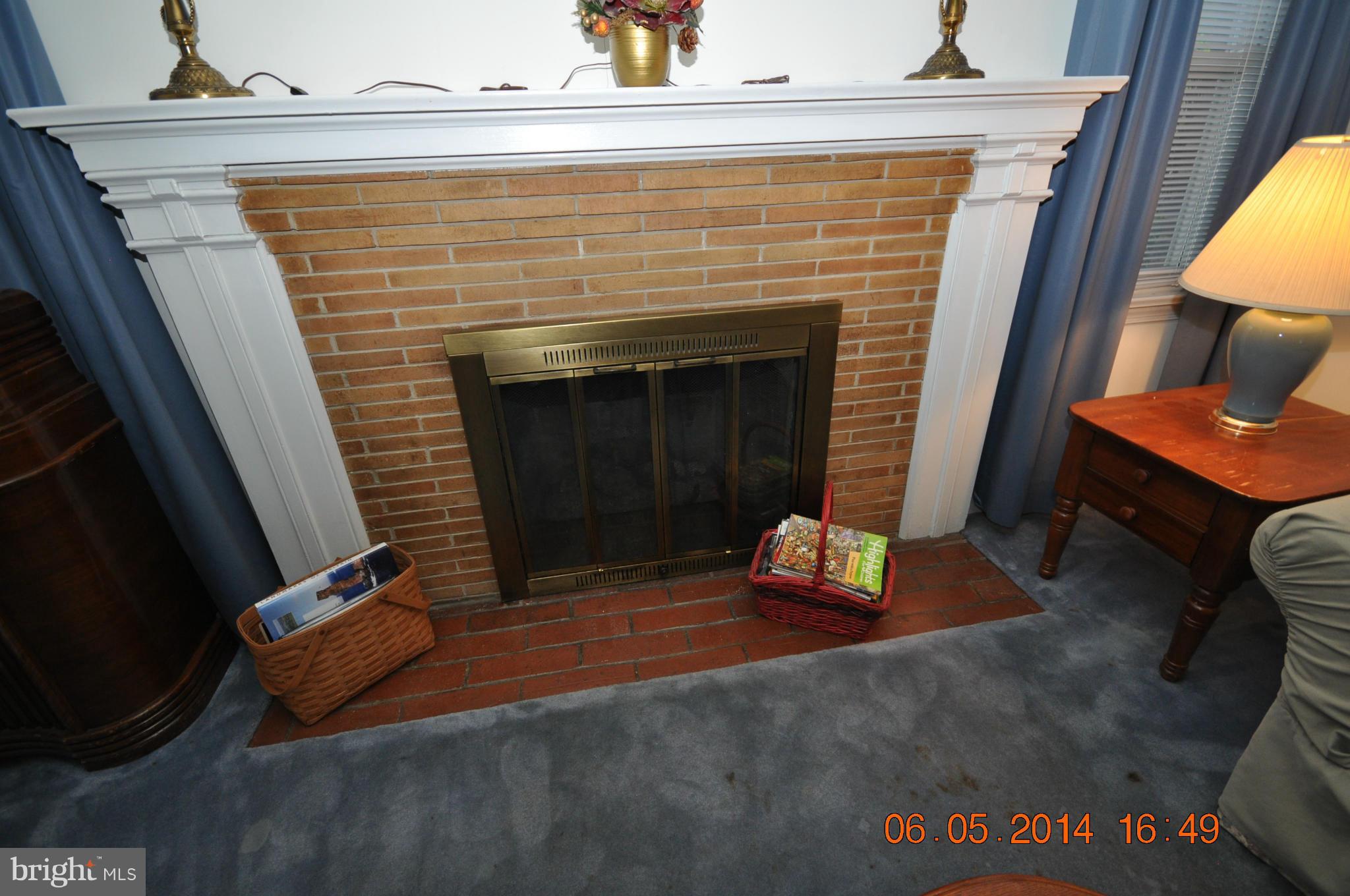 5905 Brookland Road Alexandria, VA 22310 - Photo 19 of 24 a living room with furniture and a fireplace