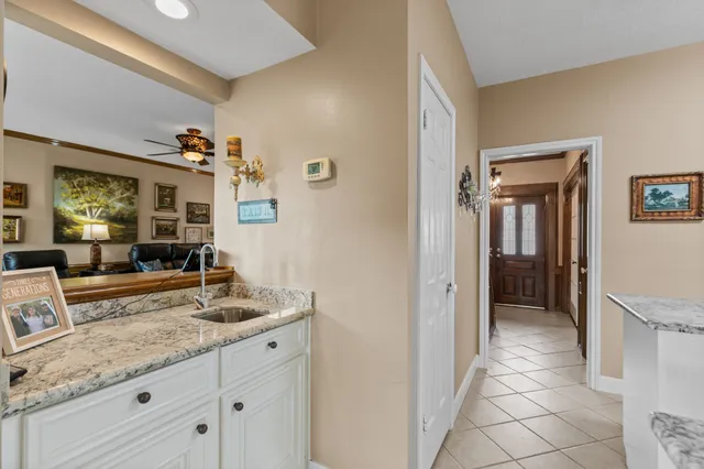 a view of living room with granite countertop furniture and fireplace