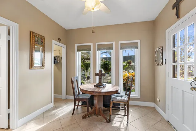 a view of a dining room with furniture window and outside view