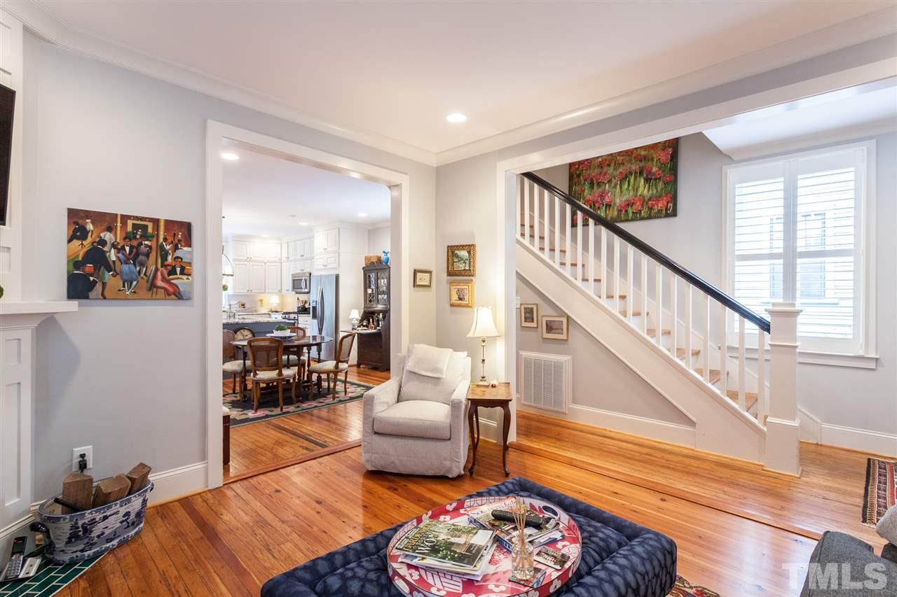 507 Adams Street Raleigh, NC 27605 - Photo 12 of 30 a living room with furniture and a rug