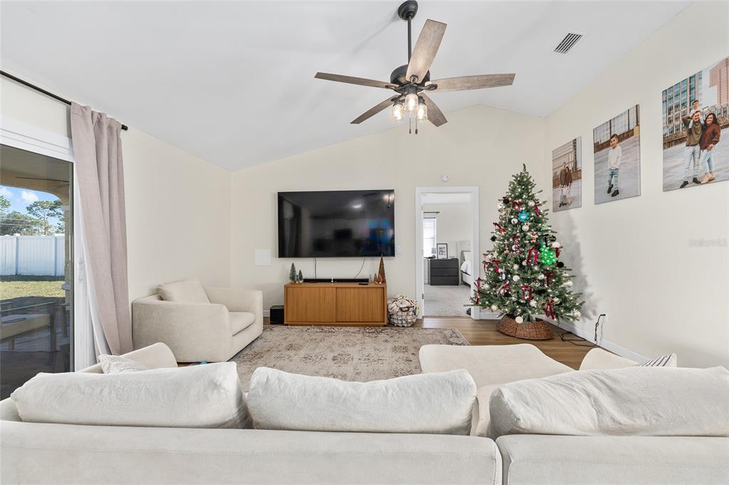 14 Bahia Trace Loop Ocala, FL 34472 - Photo 18 of 46 a living room with furniture and a flat screen tv