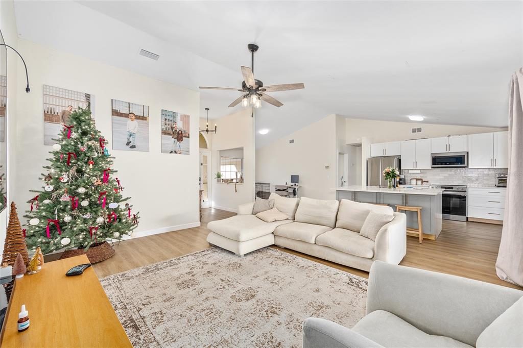 14 Bahia Trace Loop Ocala, FL 34472 - Photo 20 of 46 a living room with furniture fireplace and flowers