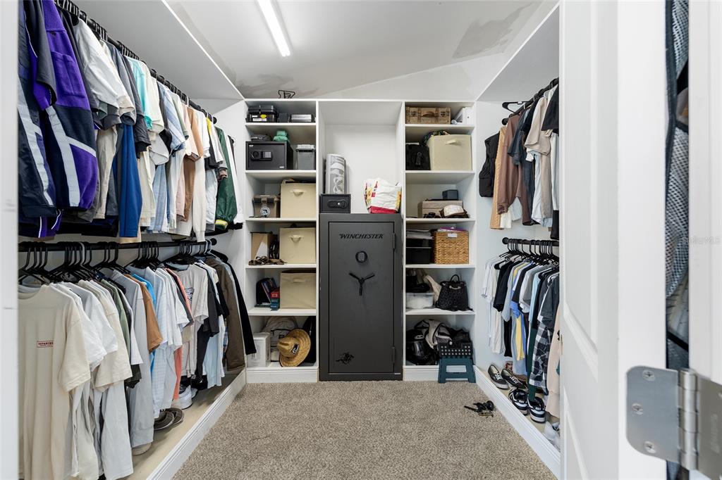 14 Bahia Trace Loop Ocala, FL 34472 - Photo 31 of 46 a view of walk in closet with clothes and shoes