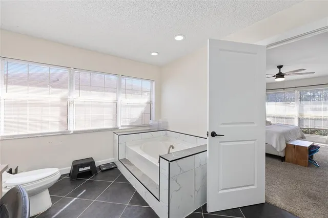 a room with a bed and a window