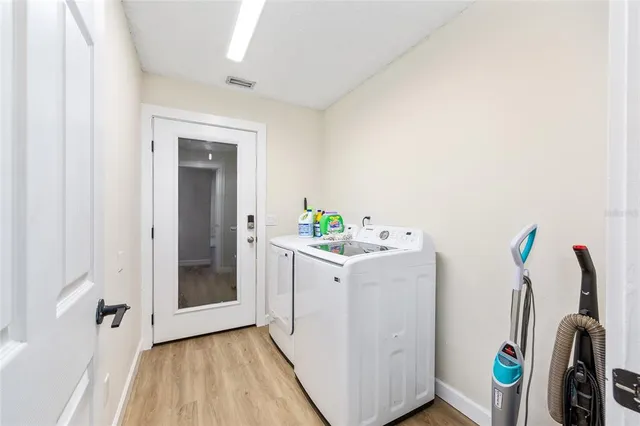 a view of utility room with washer and dryer