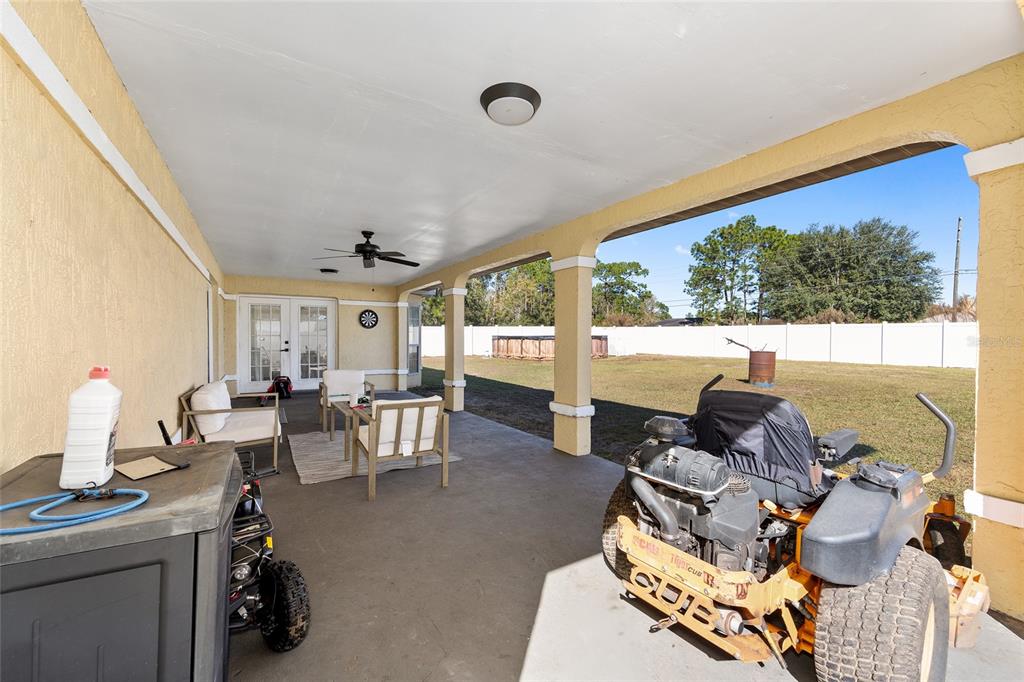 14 Bahia Trace Loop Ocala, FL 34472 - Photo 46 of 46 a living room with furniture and a large window