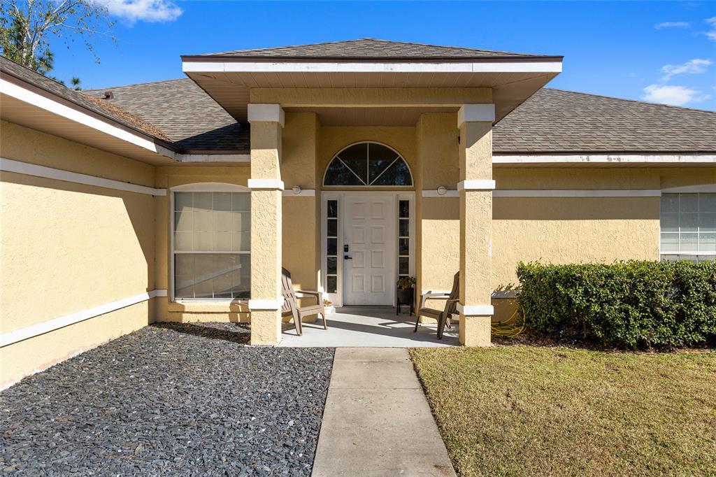 14 Bahia Trace Loop Ocala, FL 34472 - Photo 6 of 46 a front view of a house with basket ball court