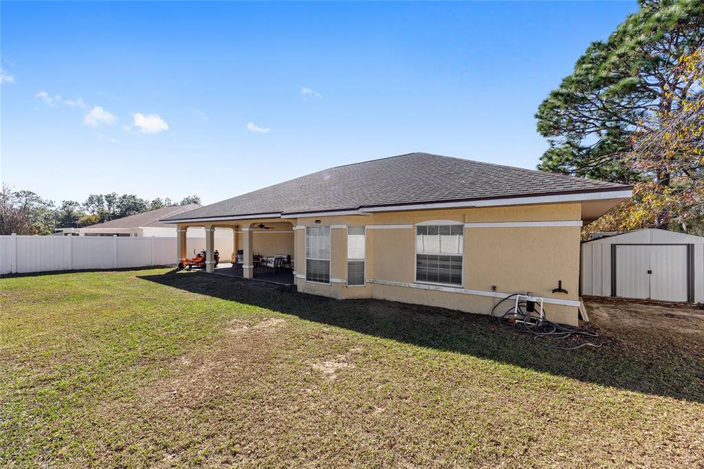 14 Bahia Trace Loop Ocala, FL 34472 - Photo 10 of 46 a front view of a house with garden