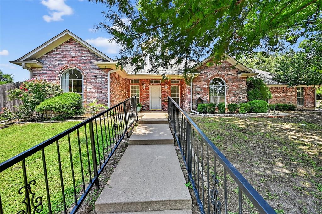 2107 Meadows Circle Sherman, TX 75092 - Photo 34 of 36 a view of a house with a yard