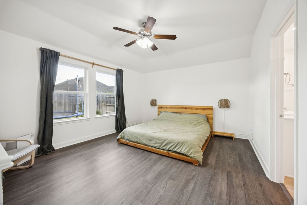 4431 Upland Stream Lane Katy, TX 77493 - Photo 10 of 17 a bedroom with a bed and window