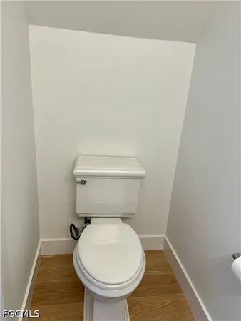 a bathroom with a toilet and a sink