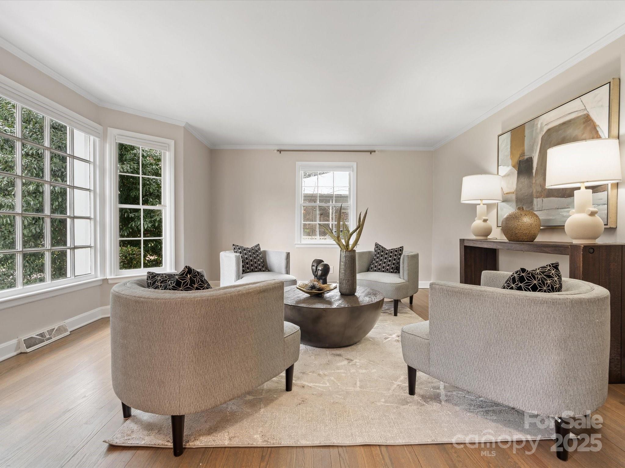 122 Lansdowne Road Charlotte, NC 28270 - Photo 15 of 21 a living room with furniture and a large window