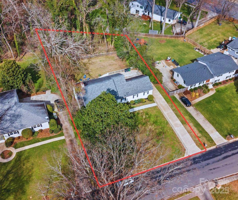 122 Lansdowne Road Charlotte, NC 28270 - Photo 21 of 21 an aerial view of a house with a yard
