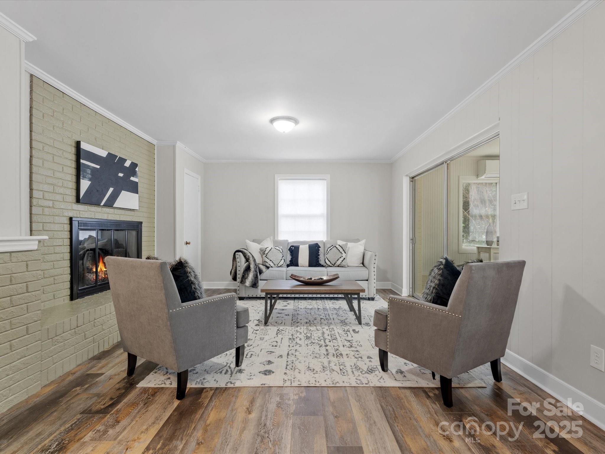 122 Lansdowne Road Charlotte, NC 28270 - Photo 6 of 21 a living room with furniture and a couch