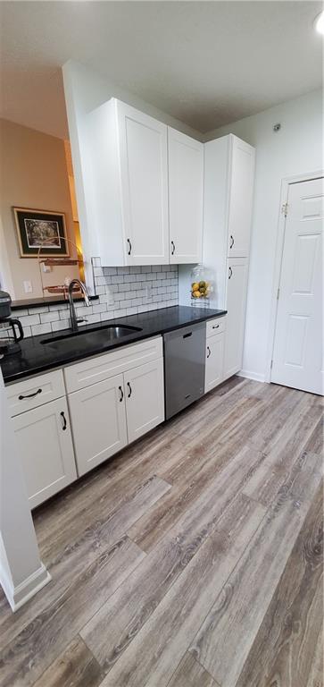 216 Stockton Ridge Cranberry Township, PA 16066 - Photo 12 of 25 a kitchen with granite countertop white cabinets and a sink