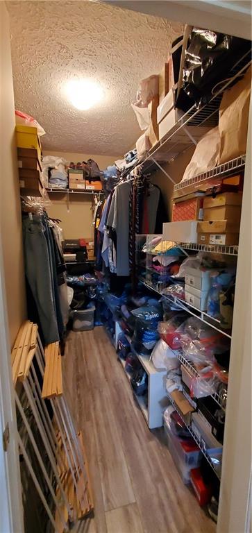 216 Stockton Ridge Cranberry Township, PA 16066 - Photo 16 of 25 a view of walk in closet with clothes and shoes