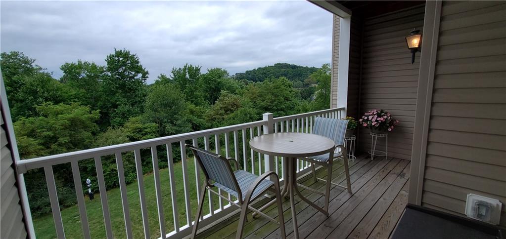 216 Stockton Ridge Cranberry Township, PA 16066 - Photo 20 of 25 a view of a balcony with wooden floor and outdoor seating