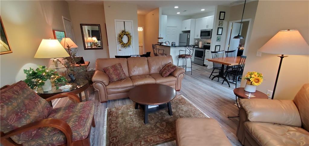 216 Stockton Ridge Cranberry Township, PA 16066 - Photo 6 of 25 a living room with furniture and a lamp