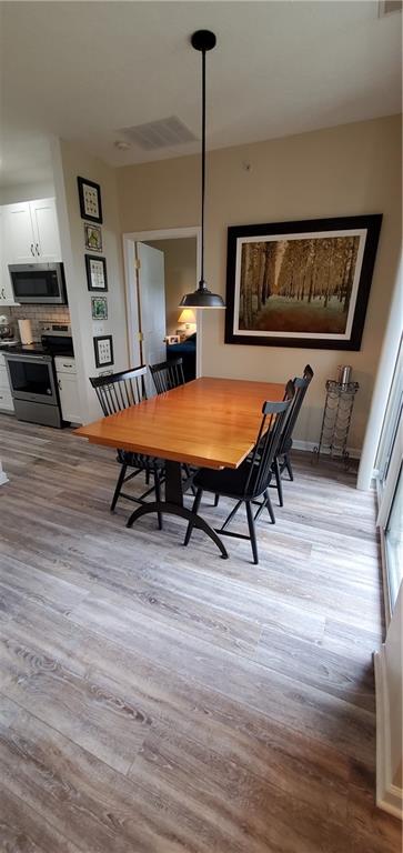 216 Stockton Ridge Cranberry Township, PA 16066 - Photo 8 of 25 a room with furniture and wooden floor