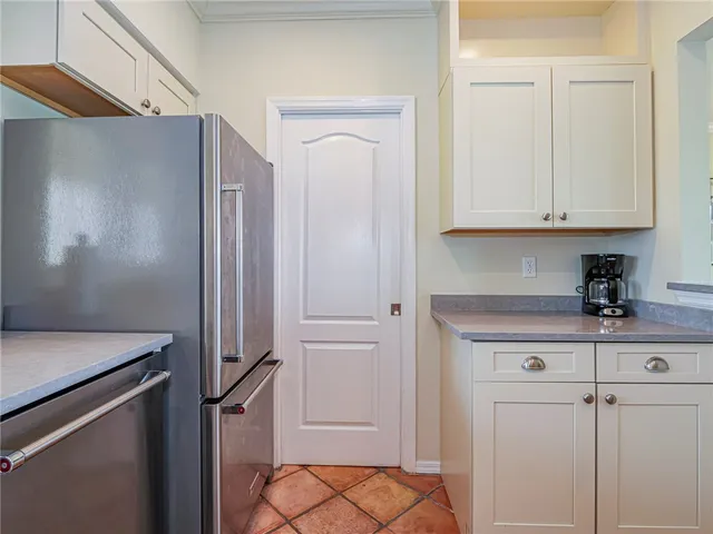 a view of cabinets and wooden floor