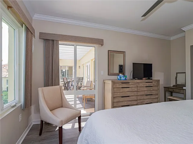 a room with a bed and a chair