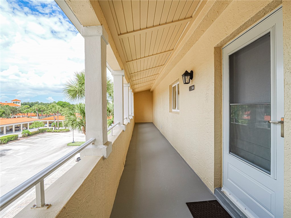 5060 Harmony Circle, Unit 304 Vero Beach, FL 32967 - Photo 7 of 36 a view of a balcony