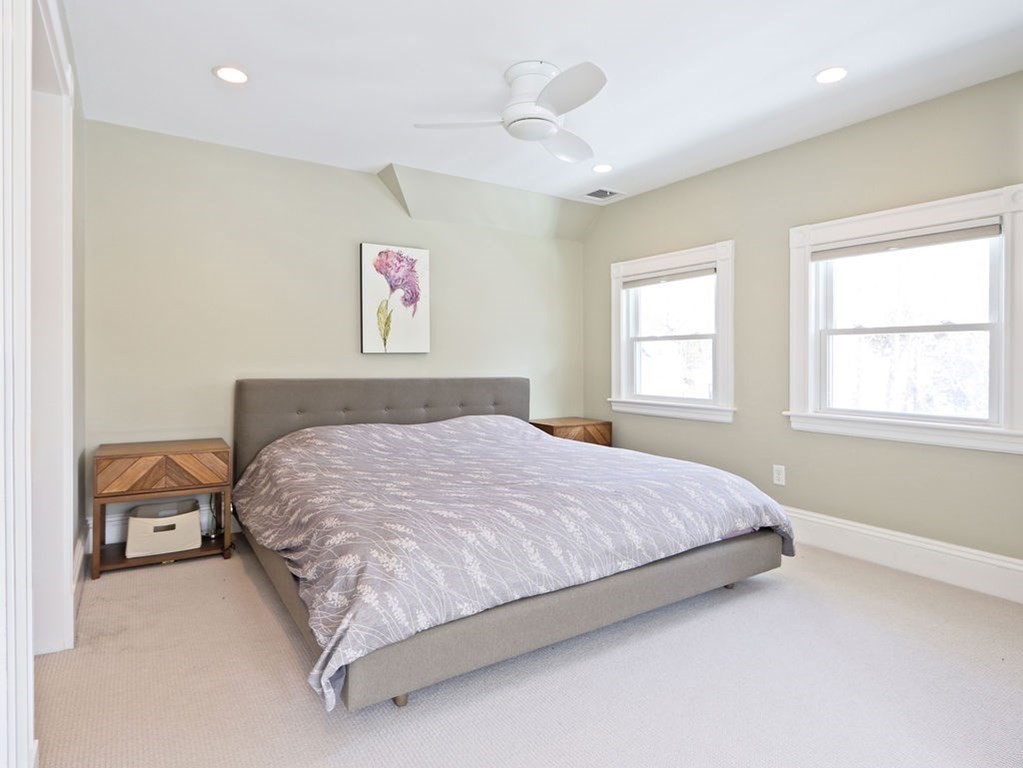 53 Marshall Street Newton, MA 02459 - Photo 17 of 42 a bedroom with a bed and window