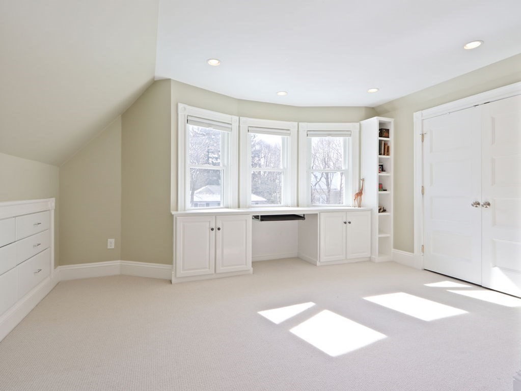 53 Marshall Street Newton, MA 02459 - Photo 18 of 42 a view of an empty room with a window