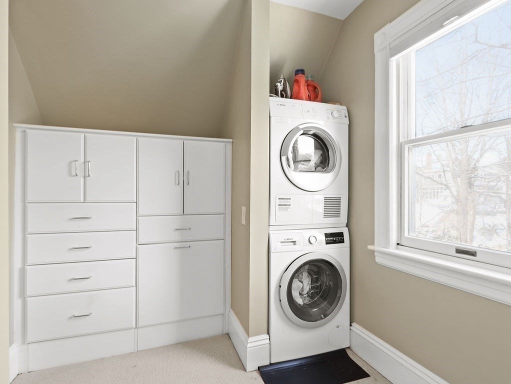 53 Marshall Street Newton, MA 02459 - Photo 22 of 42 a utility room with dryer and washer