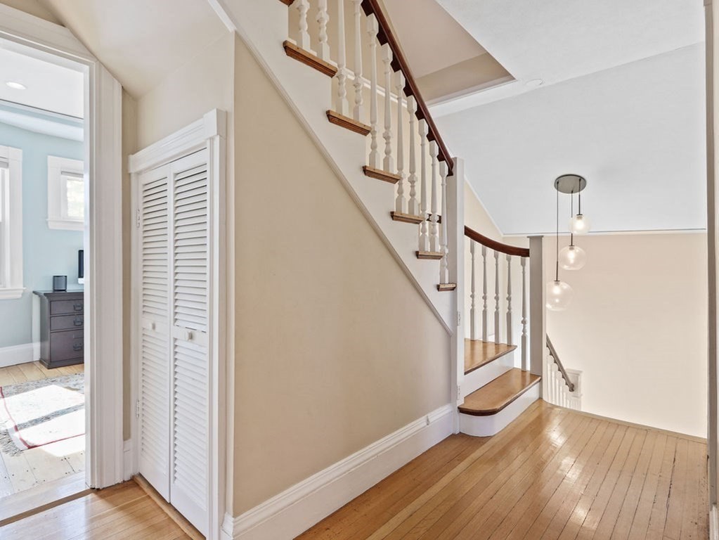 53 Marshall Street Newton, MA 02459 - Photo 23 of 42 a view of entryway with wooden floor and stairs