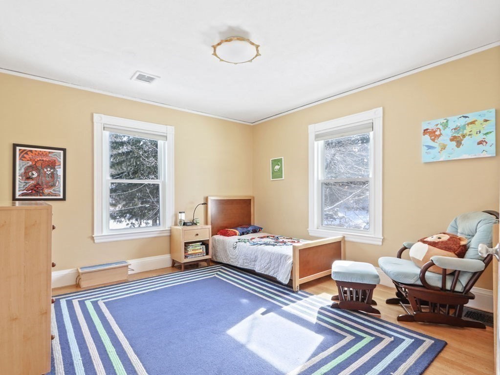 53 Marshall Street Newton, MA 02459 - Photo 25 of 42 a bedroom with furniture and a window