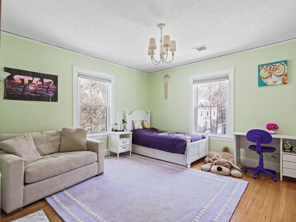 53 Marshall Street Newton, MA 02459 - Photo 27 of 42 a bedroom with furniture or couch and a window