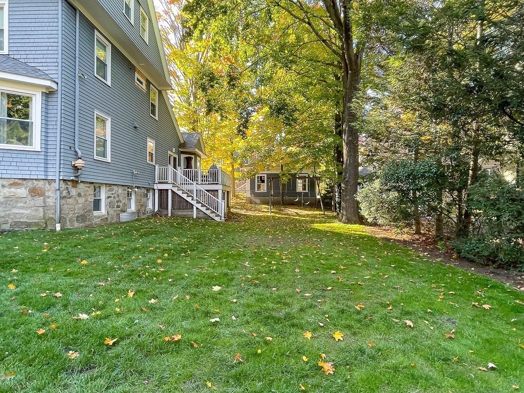 53 Marshall Street Newton, MA 02459 - Photo 38 of 42 a view of a house with a yard