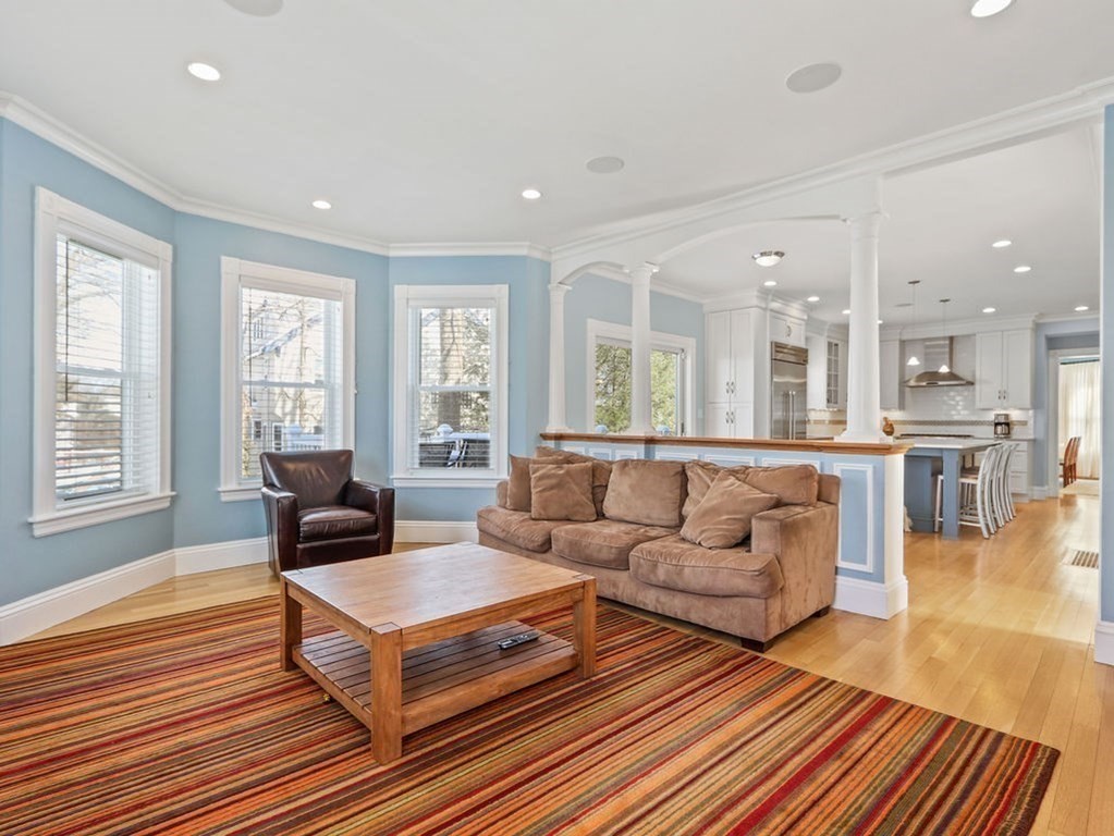53 Marshall Street Newton, MA 02459 - Photo 7 of 42 a living room with furniture and a wooden floor