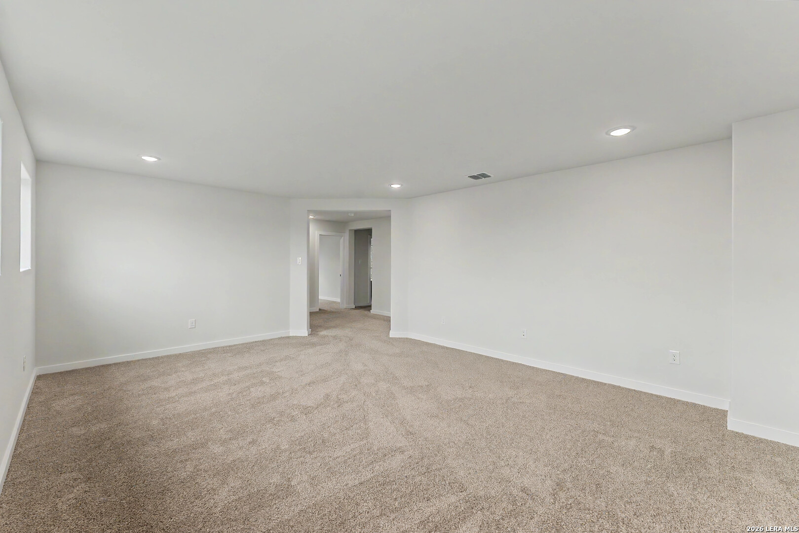 16515 Rosemary Ridge Elmendorf, TX 78112 - Photo 17 of 27 a view of an empty room with a window