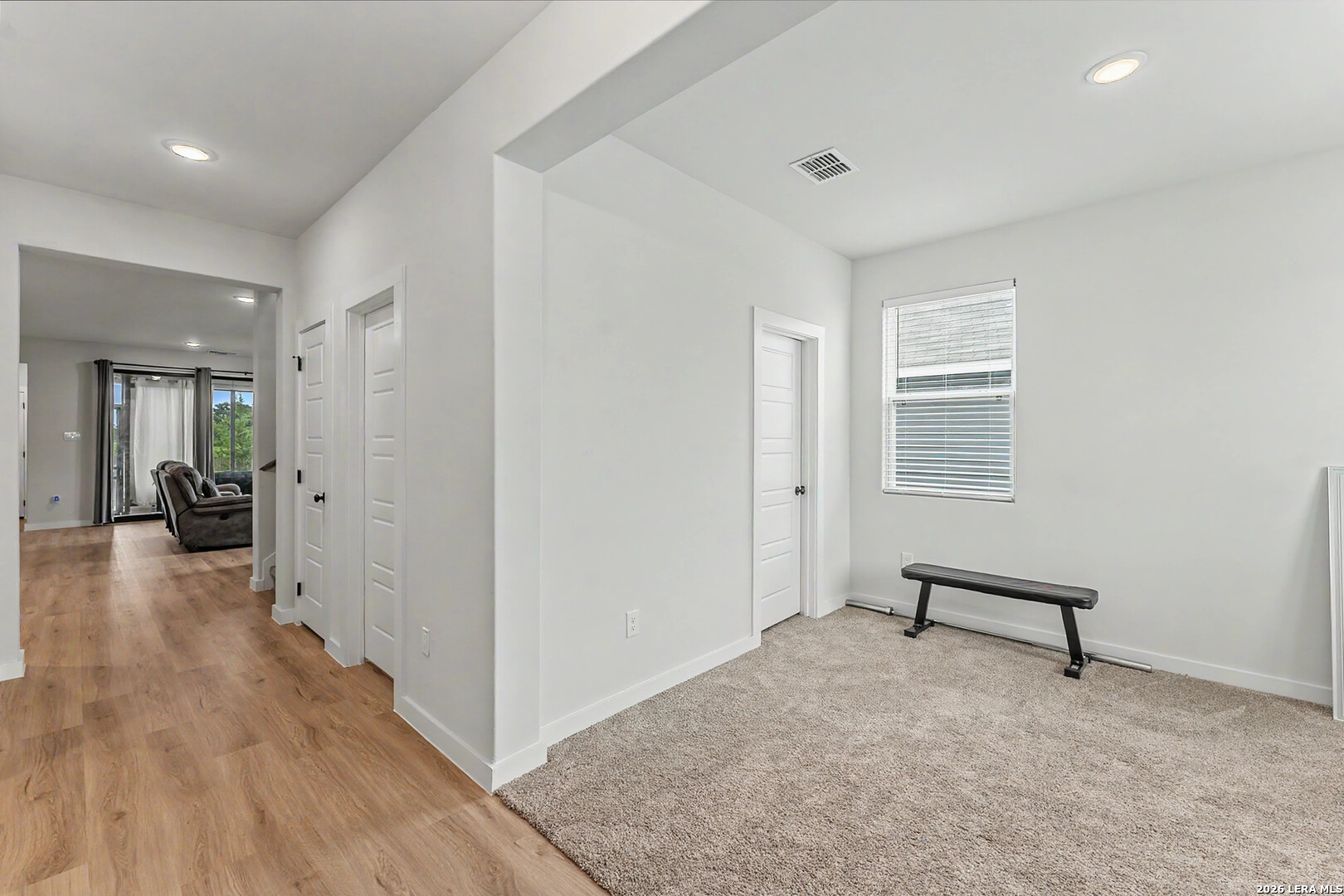 16515 Rosemary Ridge Elmendorf, TX 78112 - Photo 3 of 27 a view of a livingroom with furniture and hardwood floor