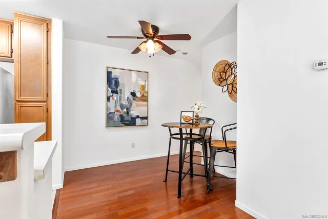 a view of a livingroom with furniture and wooden floor