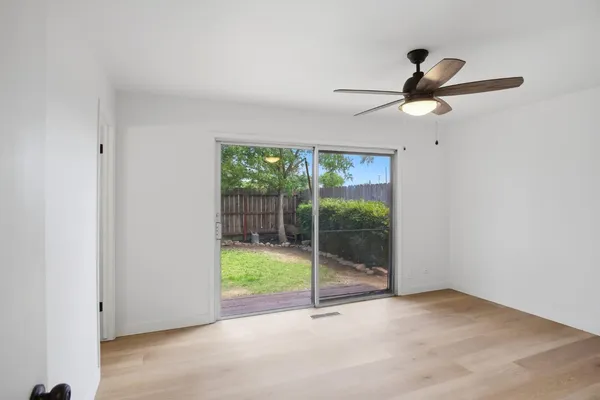 a view of an empty room and window